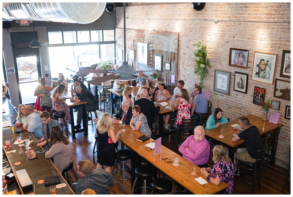 A Wedding Cocktail Hour on the lower floor of Cork and Tap in Oregon IL My Saving Grace Photography