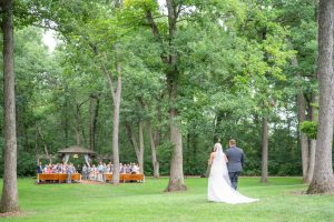 bride walking towards ceremony at Kilbuck Creek Monroe Center Illinois